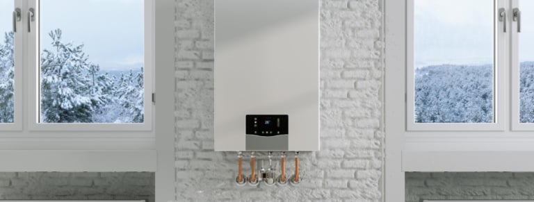 fixer chauffe eau plat mur briques