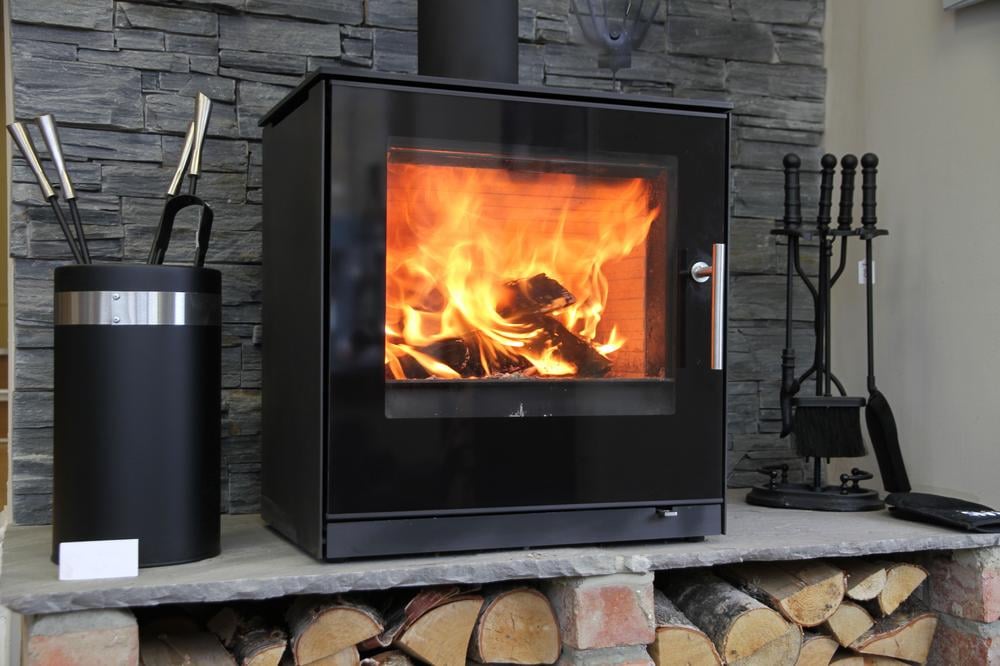 nettoyer efficacement vitre cheminee noircie